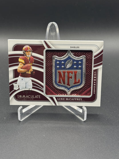 2024 Immaculate #RJL-LMY Luke McCaffrey Rookie NFL Shield Auto 1/1 PC