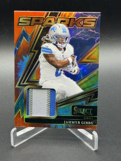 2025 Panini Select #SPK-JGS Jahmyr Gibbs Sparks Tie-Dye Prizm #/25