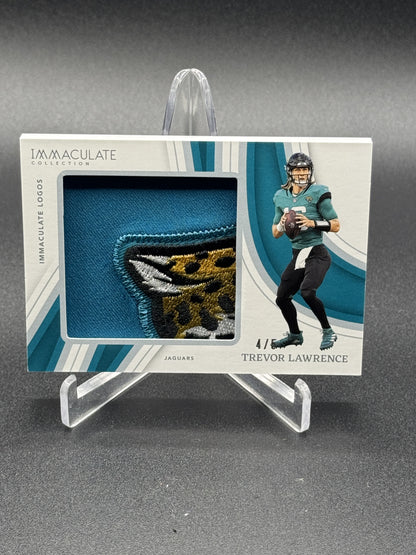 2023 Panini Immaculate Collection #IL-TLAW Trevor Lawrence Immaculate Logos #/5