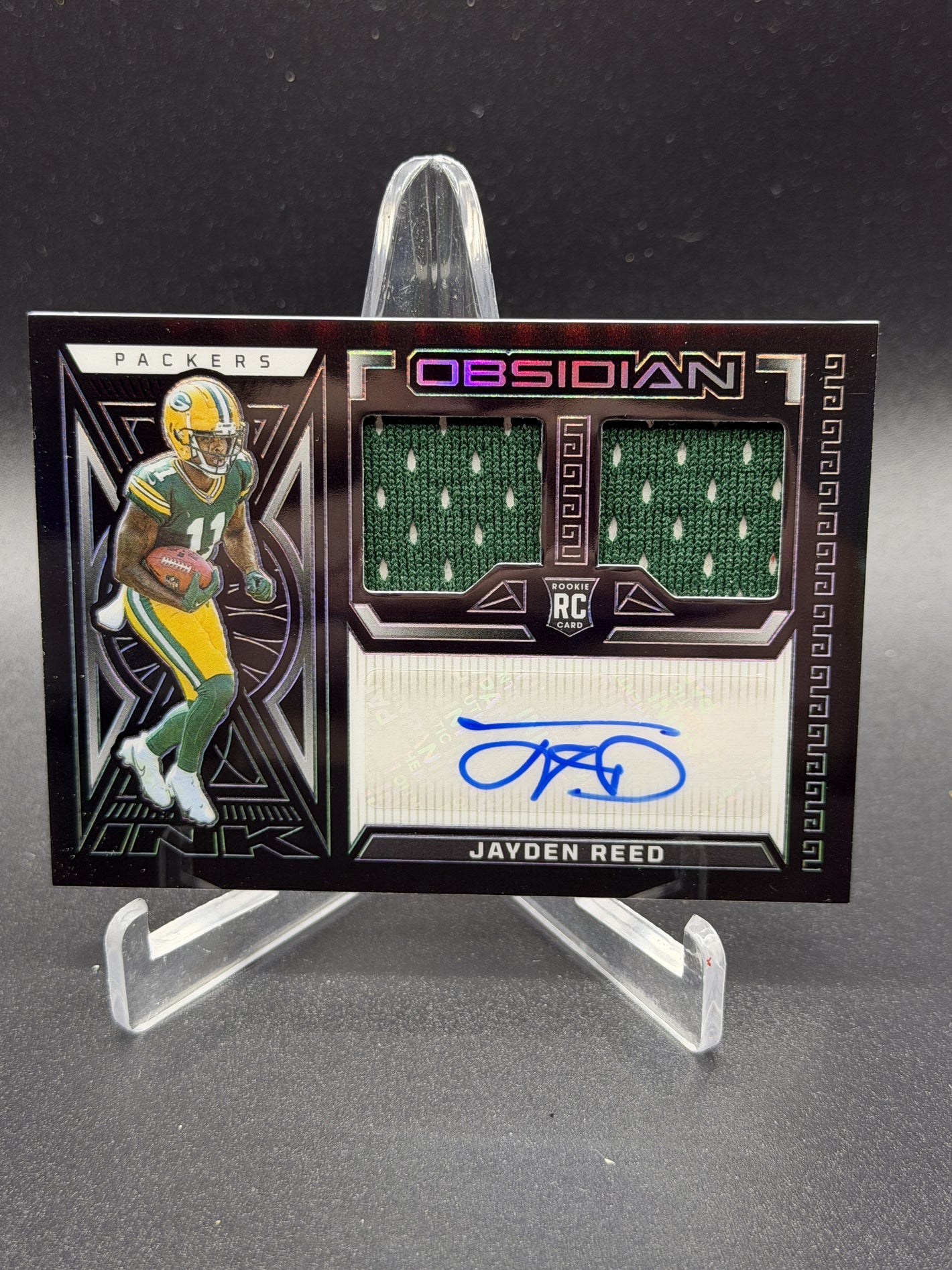 2023 Panini Obsidian #RJI-JRE Jayden Reed Rookie Jersey Ink #/199