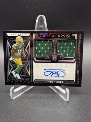 2023 Panini Obsidian #RJI-JRE Jayden Reed Rookie Jersey Ink #/199