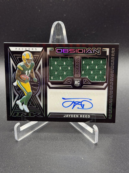 2023 Panini Obsidian #RJI-JRE Jayden Reed Rookie Jersey Ink #/199