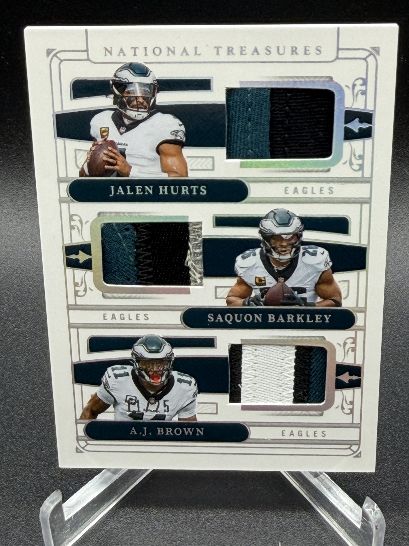 2025 National Treasures Jalen Hurts AJ Brown Saquon Barkley NFL Gear Trio /25