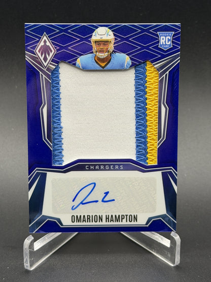 2025 Panini Phoenix #RPS-OHN Omarion Hampton Rookie Patch Auto Blue Prizm #/49